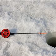 Picture Of Fishing Rod At Ice Hole